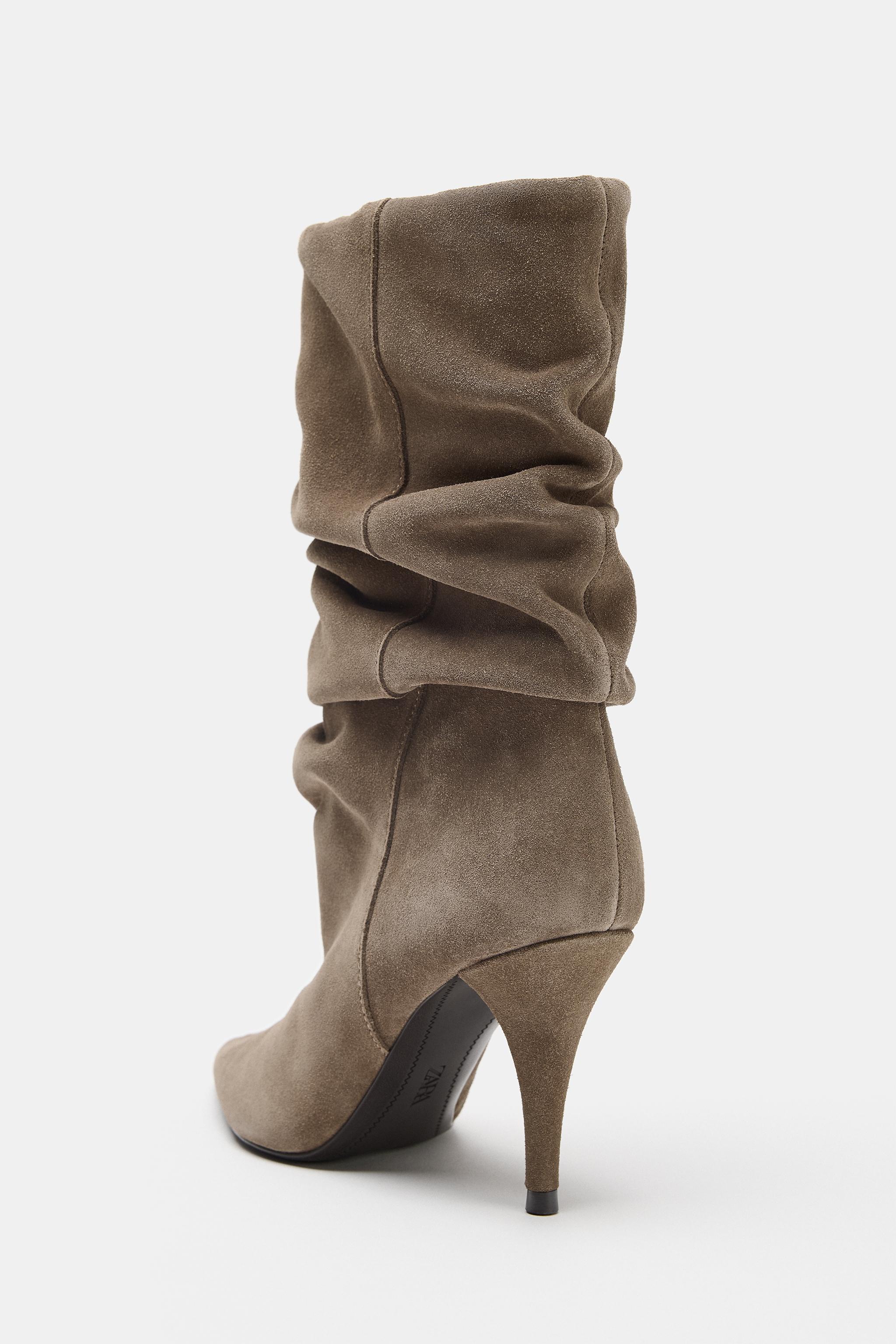 BOTTES À TALONS FRONCÉES EN CROÛTE DE CUIR